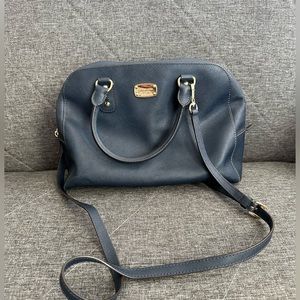 Micheal Kors stachels